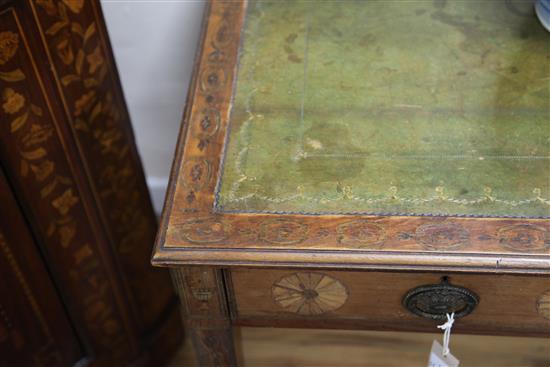 A George III marquetry inlaid satinwood writing table, W.3ft 3in. D.2ft 2in. H.2ft 7in.